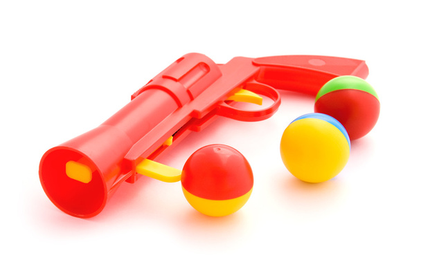 Pistola de juguete sobre fondo blanco
 - Foto, imagen