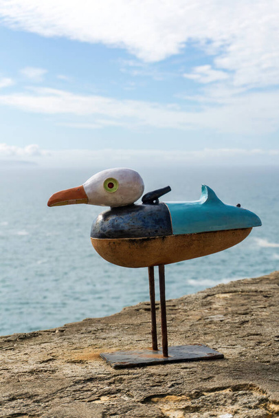 Figurine of seagull on the wall of the fortress in Nazare close up, Portugal - Foto, afbeelding