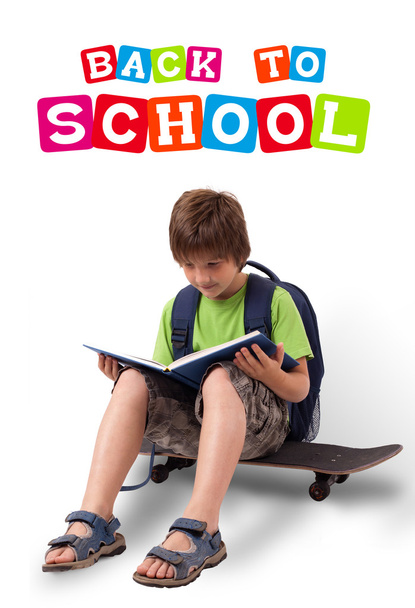 Kid on skateboard with back to school theme isolated on white - Photo, image
