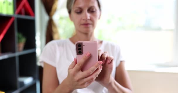 Portrait of woman dialing phone number talking on mobile phone. Businesswoman holding modern smartphone technology and pleasant conversation concept - Materiał filmowy, wideo