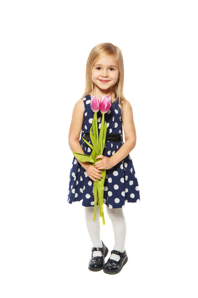 Little girl with tulips - Foto, Imagem