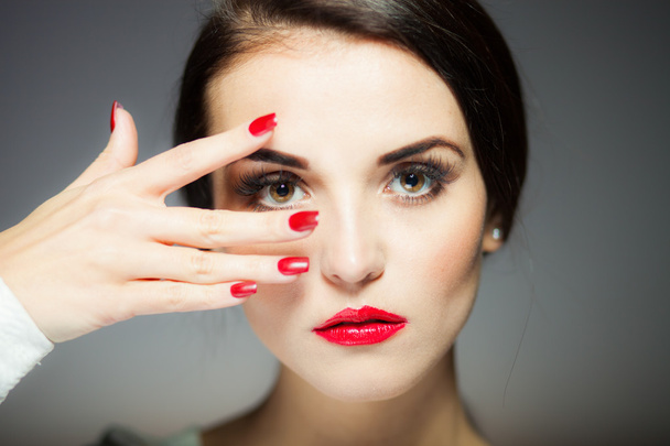 Natural woman face with red nails and lips - Фото, зображення