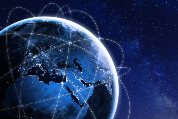 Global connectivity concept with worldwide communication network connection lines around planet Earth viewed from space, satellite orbit, city lights in Europe, some elements from NASA - Foto, Imagen