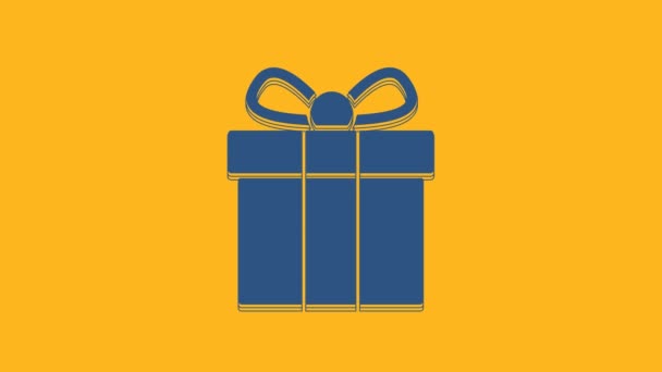 Blue Gift box icon isolated on orange background. 4K Video motion graphic animation . - Felvétel, videó