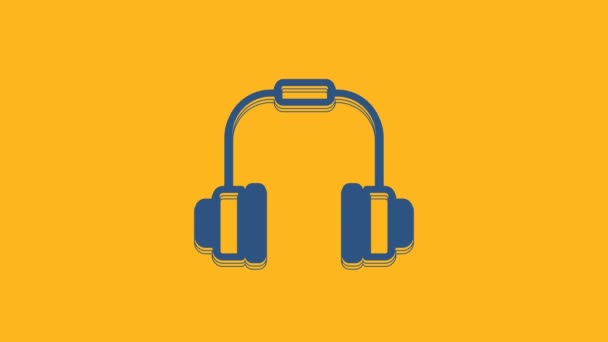 Blue Headphones icon isolated on orange background. Earphones. Concept for listening to music, service, communication and operator. 4K Video motion graphic animation . - Video, Çekim