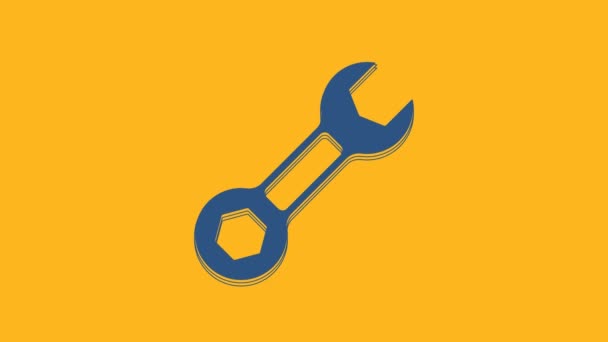 Blue Wrench spanner icon isolated on orange background. 4K Video motion graphic animation . - Materiał filmowy, wideo