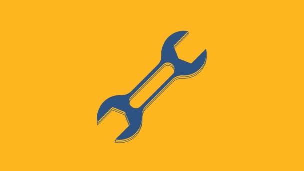 Blue Wrench spanner icon isolated on orange background. 4K Video motion graphic animation . - Materiał filmowy, wideo