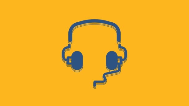 Blue Headphones icon isolated on orange background. Earphones. Concept for listening to music, service, communication and operator. 4K Video motion graphic animation . - Video, Çekim