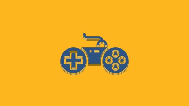Blue Gamepad icon isolated on orange background. Game controller. 4K Video motion graphic animation . - Video