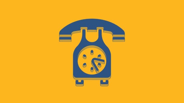 Blue Telephone handset icon isolated on orange background. Phone sign. 4K Video motion graphic animation . - Video, Çekim