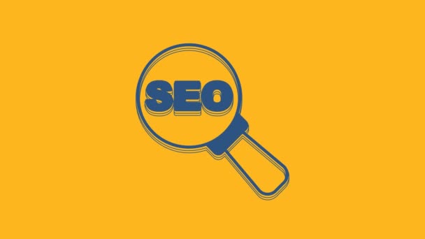 Blue SEO optimization icon isolated on orange background. 4K Video motion graphic animation . - Materiał filmowy, wideo