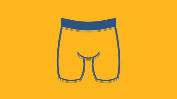 Azul icono de los pantalones cortos de ciclismo aislado sobre fondo naranja. Animación gráfica de vídeo 4K. - Metraje, vídeo