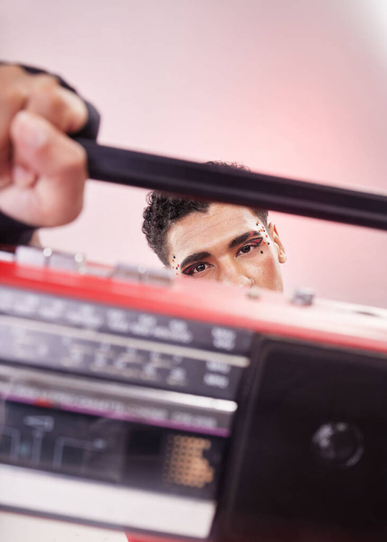 Boombox, portrait and young man isolated on gradient background music, gen z aesthetic and streetwear. Dancer, hip hop and lgbtq, queer or gay model or youth person listening to retro, vintage radio. - Photo, Image