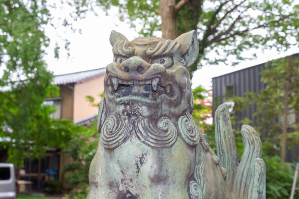 Komainu, or lion-dog, statue at Asanogawa inari jinja, Kanazawa, Japan. - Foto, afbeelding
