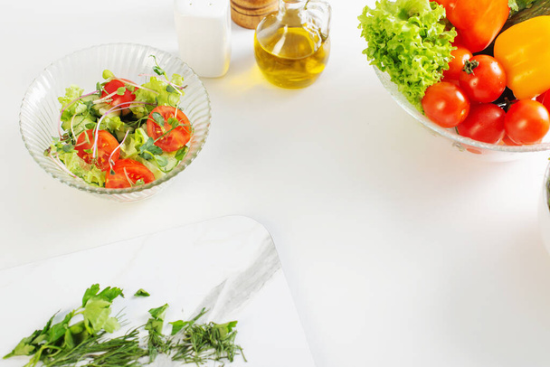 healthy vegetarian salad on white table - Фото, изображение