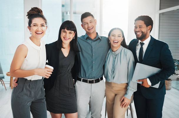 Happy, group and portrait of laughing business people together for meeting, working and teamwork. Smile, hug and corporate employees in an office for bonding, collaboration and happiness as a team. - Foto, imagen