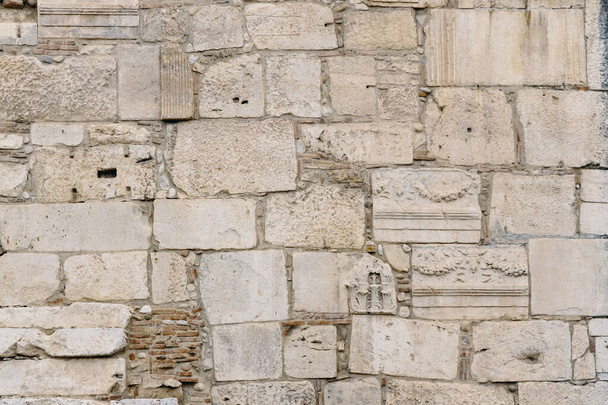 old wall of old Romanesque blocks as a background, Benevento, Campania, Italy - Photo, Image