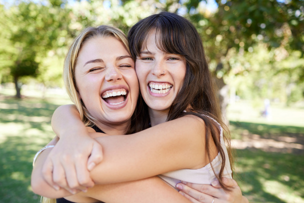 Nature, friends and portrait of women hugging with love, care and happiness in garden. Happy, smile and female friendship embracing with excitement in outdoor park while on holiday together in Canada. - Photo, Image
