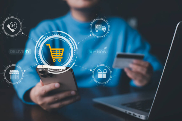 Smartphones with online shopping concepts, marketplace websites with the virtual interface of online Shopping cart part of the network, and Online shopping businesses with selecting shopping cart. - Photo, image