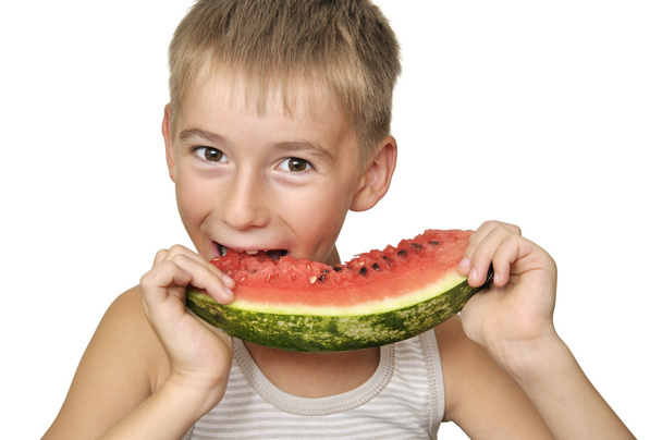 Boy eating watermelon - Foto, afbeelding