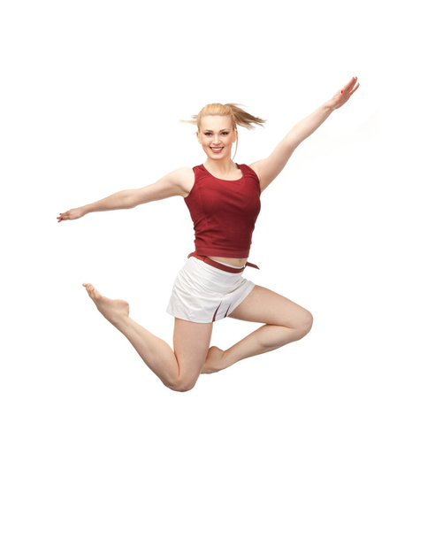 Jumping sporty girl - Fotó, kép