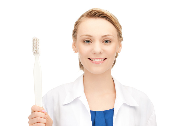 Doctor with toothbrush - Foto, Bild