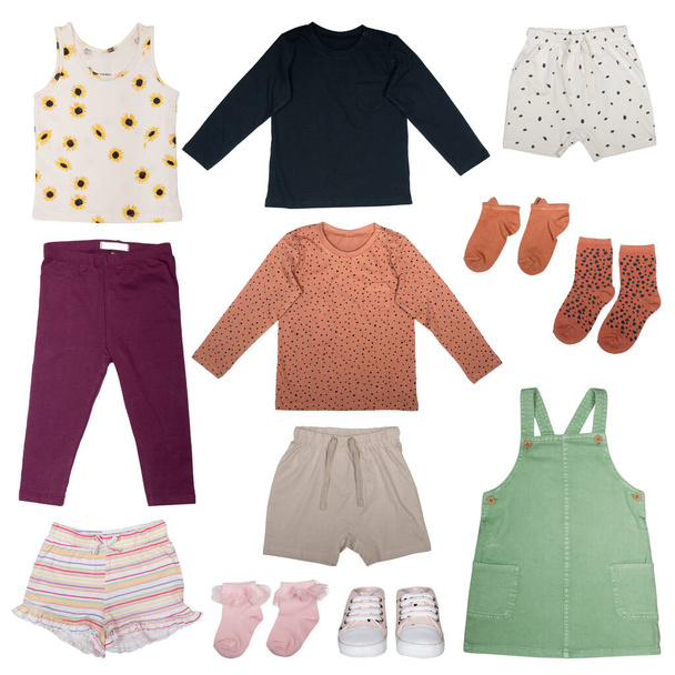 collage of clothes for a little girl isolated on a white background - Foto, immagini