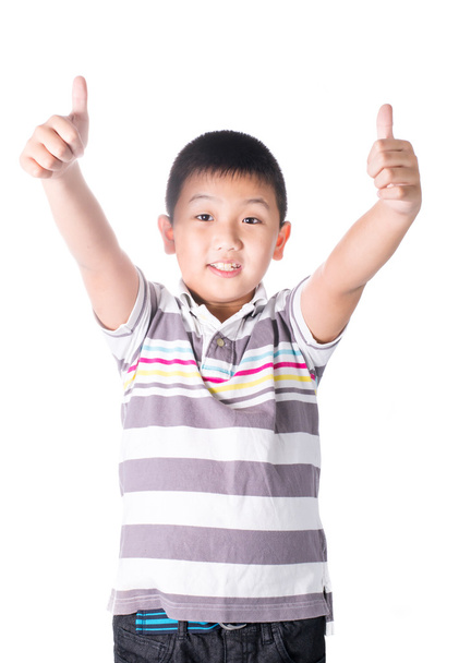 Asian boy giving you thumbs up over white background, isolated - Foto, Bild