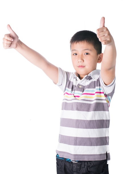 Asian boy giving you thumbs up over white background, isolated - Photo, Image