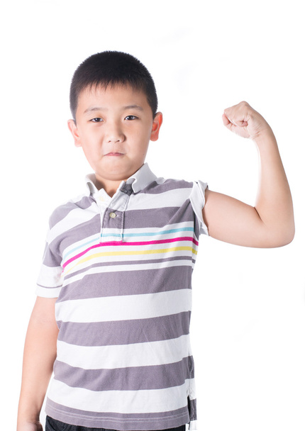 Strong Asian boy showing off his biceps flexing muscles his arm, isolated on white background - Foto, Imagen