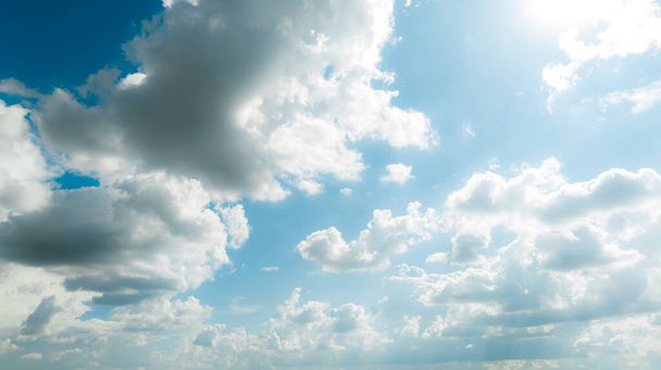 Beautiful blue sky and white clouds abstract background. Cloudscape background. Blue sky and fluffy white clouds on sunny day. Beautiful blue sky. World Ozone Day. Ozone layer. Summer sky. - Photo, Image