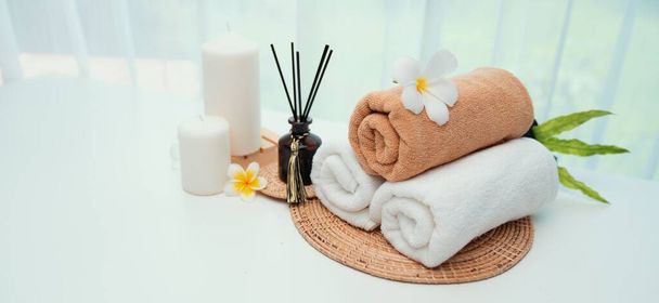 Spa accessory composition set in day spa hotel , beauty wellness center . Spa product are placed in luxury spa resort room , ready for massage therapy from professional service . - Foto, Bild