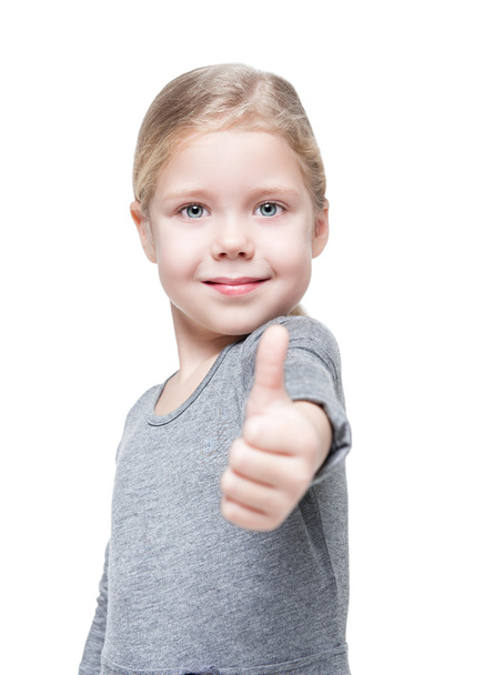 Beautiful little girl showing thumbs up isolated  - Fotografie, Obrázek