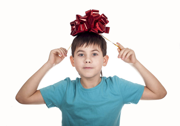little boy with a red bow in hand - Photo, image