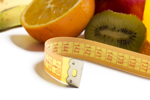 Fruits with measuring tape isolated - Foto, Bild