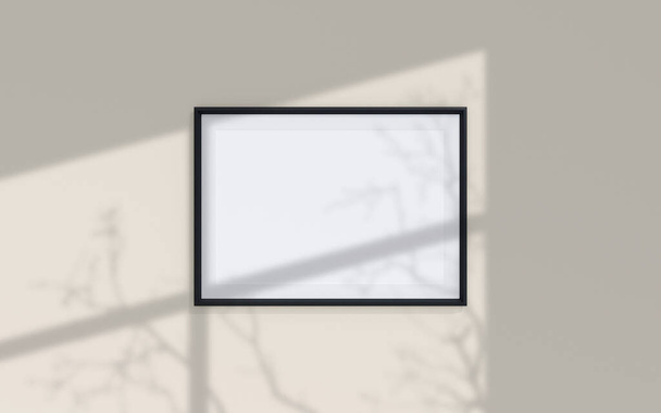 Clean and minimalist front view landscape black photo or poster frame mockup hanging on the wall with shadow overlay. 3d rendering. - Foto, immagini