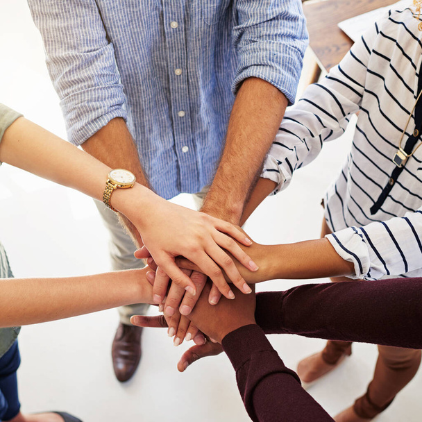 Business people, hands and unity in collaboration for teamwork, goal or diversity above at the workplace. Hand of group piling in team trust for community, motivation or agreement together. - Фото, зображення