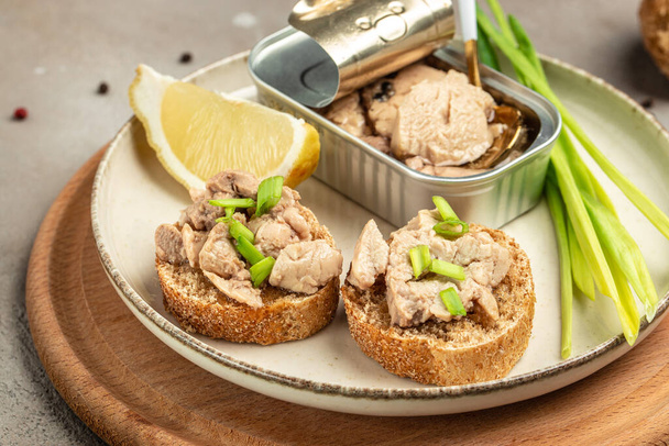 tasty snacks with cod liver on rye bread. Healthy food concept. Food recipe background. Close up. - Foto, Imagen