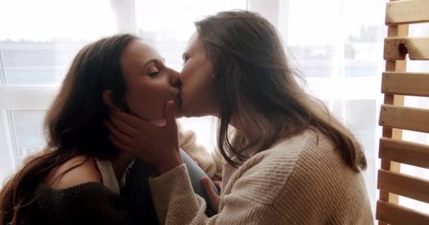 Close up look at face. look in the eyes in love. lgbt and lesbian women at home. Embrace and holding each other. Romance and portrait of lesbian couple enjoying. LGBT rights, - Footage, Video