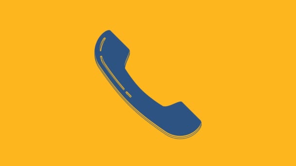 Modrý telefon sluchátko ikona izolované na oranžovém pozadí. Telefonní značka. Grafická animace pohybu videa 4K. - Záběry, video