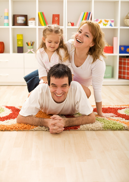 Happy family in the kids room - Photo, Image