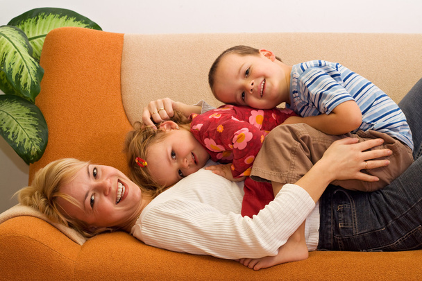 Happy woman and kids having fun indoors - Zdjęcie, obraz