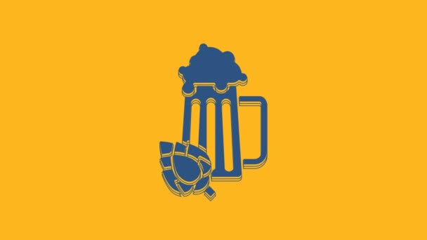 Голубой стакан пива и значок хмеля на оранжевом фоне. Видеографическая анимация 4K. - Кадры, видео