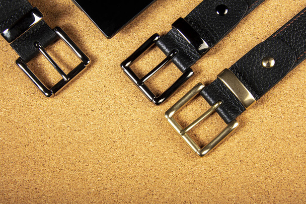 Part of leather belts with metal buckles. - Photo, image