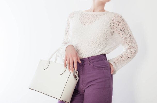 woman with handbag close up on white background - Fotoğraf, Görsel