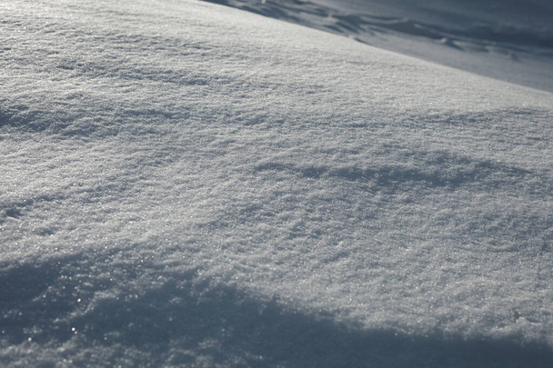 A snow covered surface of relief - Foto, Imagem