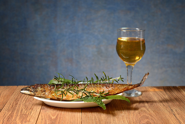 Baked mackerel fish and wine in the glass - Photo, Image