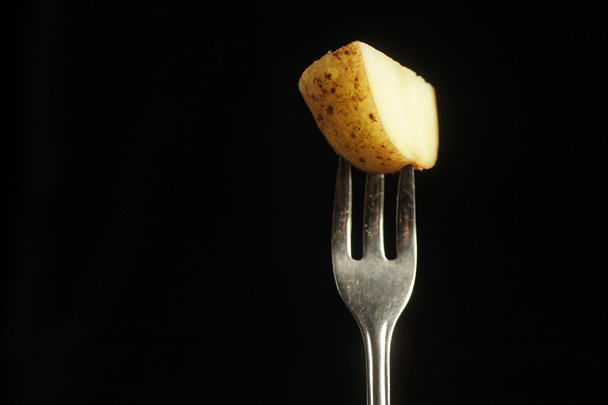 Potato on fork - Foto, Bild