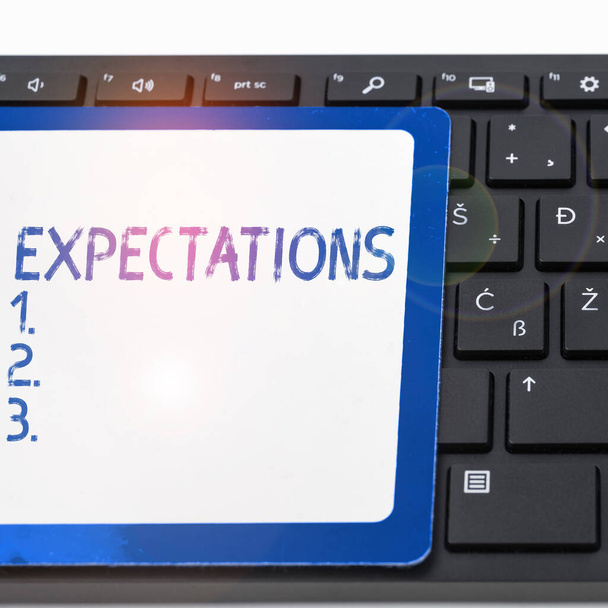 Text sign showing Expectations, Conceptual photo Strong belief that something will happen or be the case - Photo, Image