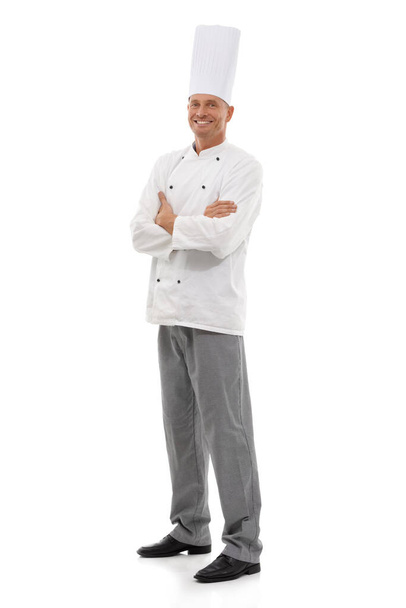 Full length studio shot of a smiling chef isolated on white. - Valokuva, kuva